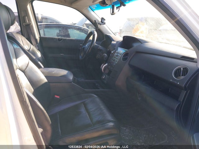 Продажа на аукционе авто 2011 Honda Pilot Touring, vin: 5FNYF4H96BB505573, номер лота: 12533824