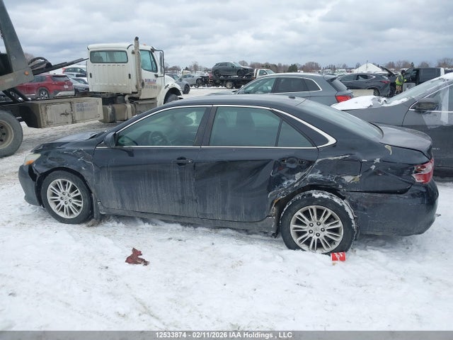 12533874 :رقم المزاد ، 4T1BF1FK2FU497443 vin ، 2015 Toyota Camry Le مزاد بيع