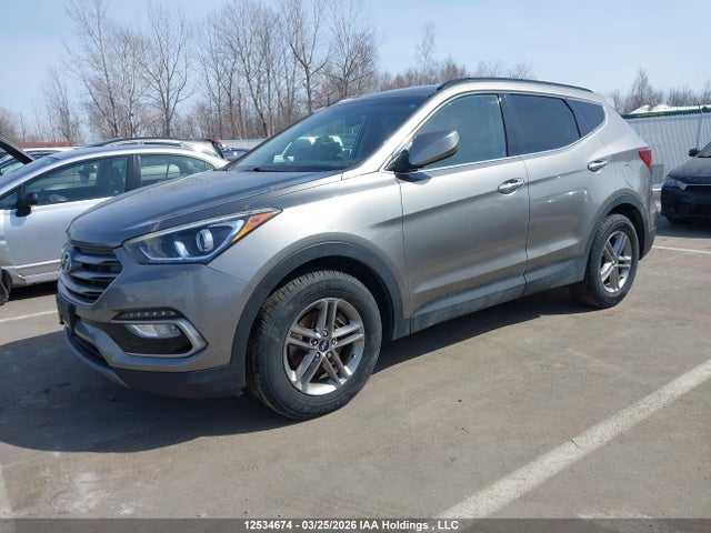 12534674 :رقم المزاد ، 5XYZT3LB7HG412936 vin ، 2017 Hyundai Santa Fe Sport مزاد بيع