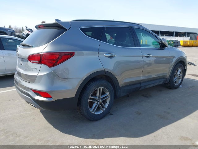 12534674 :رقم المزاد ، 5XYZT3LB7HG412936 vin ، 2017 Hyundai Santa Fe Sport مزاد بيع