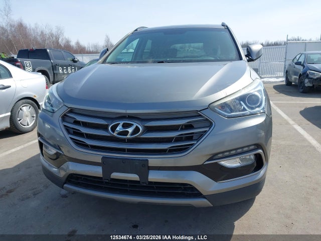 12534674 :رقم المزاد ، 5XYZT3LB7HG412936 vin ، 2017 Hyundai Santa Fe Sport مزاد بيع