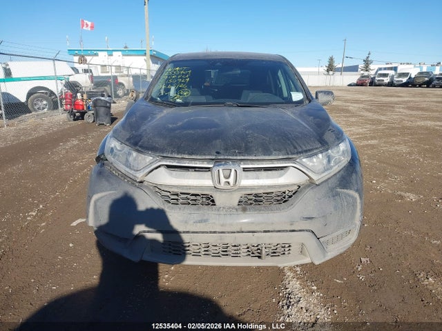 12535404 :رقم المزاد ، 2HKRW2H21KH150924 vin ، 2019 Honda Cr-v Lx مزاد بيع