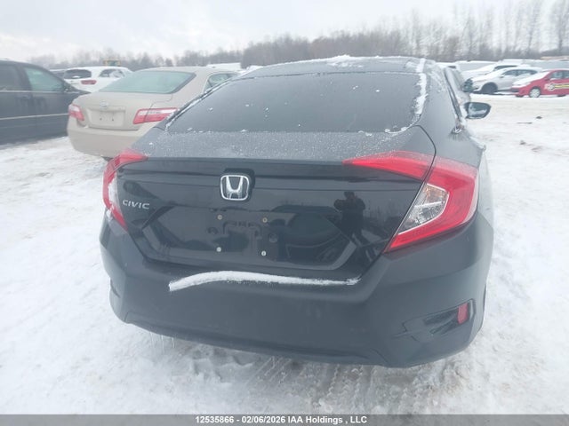 12535866 :رقم المزاد ، 2HGFC2F52JH040935 vin ، 2018 Honda Civic Lx مزاد بيع