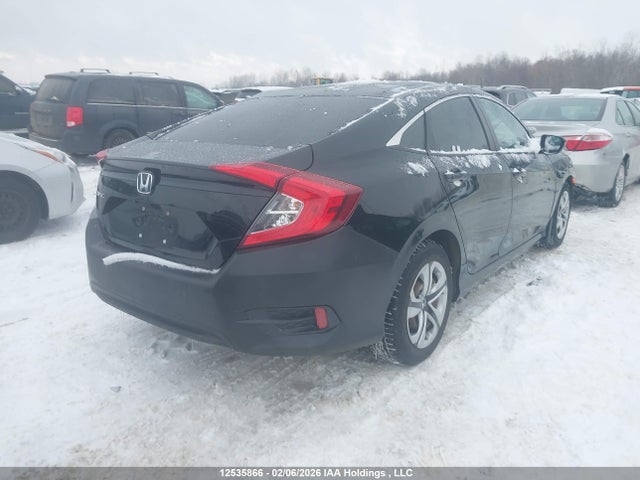 12535866 :رقم المزاد ، 2HGFC2F52JH040935 vin ، 2018 Honda Civic Lx مزاد بيع