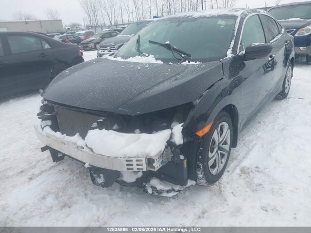 12535866 :رقم المزاد ، 2HGFC2F52JH040935 vin ، 2018 Honda Civic Lx مزاد بيع
