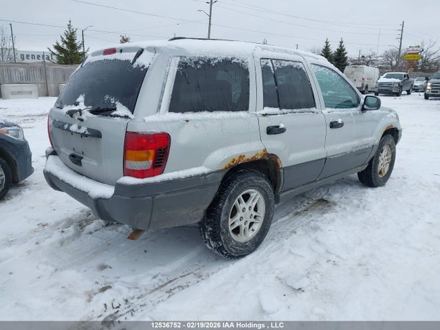2002 Jeep Grand Cherokee Laredo მანქანა იყიდება აუქციონზე, vin: 1J4GW48S52C293612, აუქციონის ნომერი: 12536752