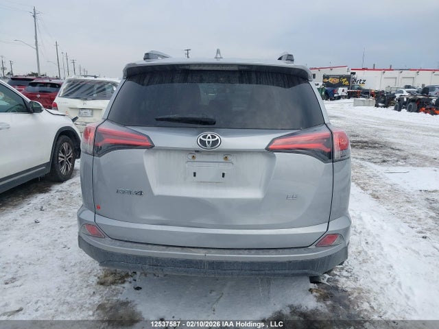 2T3ZFREV8JW504372 Toyota RAV4 LE