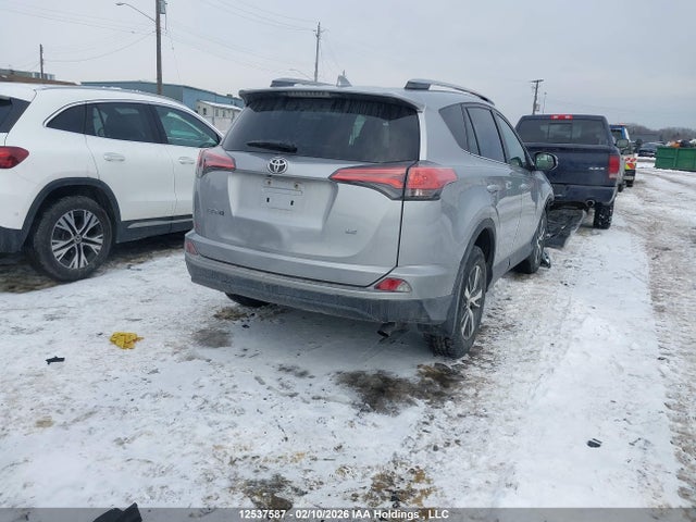2T3ZFREV8JW504372 Toyota RAV4 LE