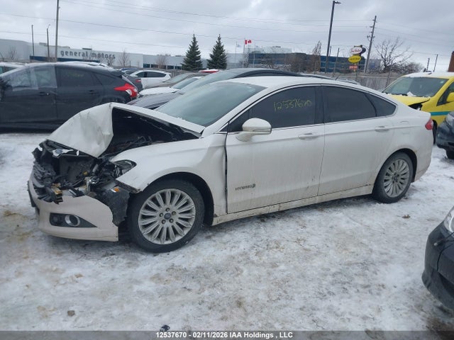 12537670 :رقم المزاد ، 3FA6P0LU6FR172830 vin ، 2015 Ford Fusion Hybrid Se مزاد بيع