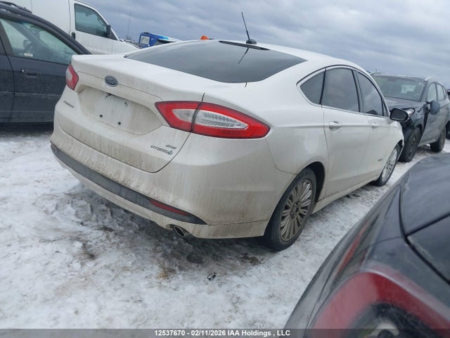 12537670 :رقم المزاد ، 3FA6P0LU6FR172830 vin ، 2015 Ford Fusion Hybrid Se مزاد بيع