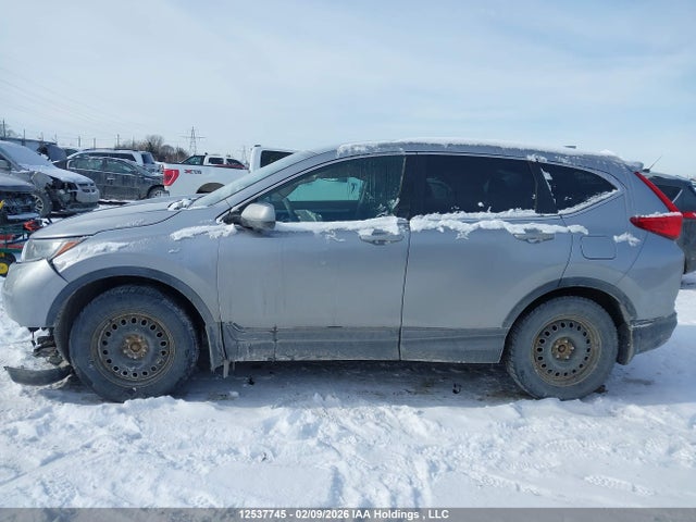12537745 :رقم المزاد ، 2HKRW2H25JH143702 vin ، 2018 Honda Cr-v Lx مزاد بيع