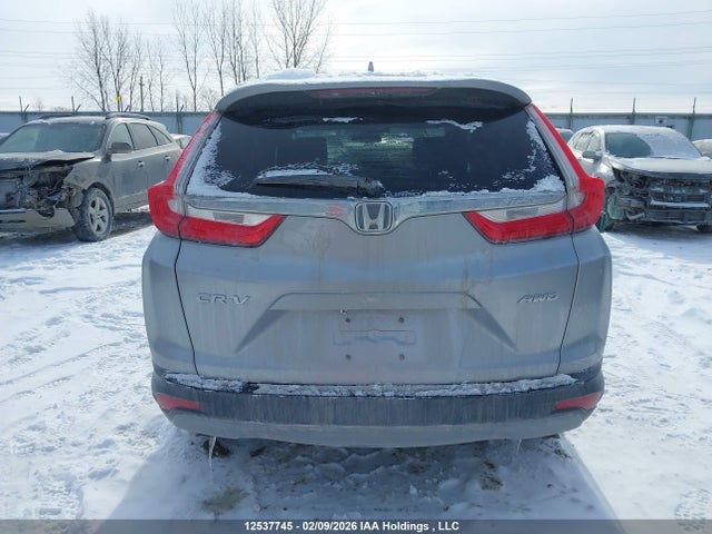 12537745 :رقم المزاد ، 2HKRW2H25JH143702 vin ، 2018 Honda Cr-v Lx مزاد بيع