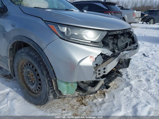 12537745 :رقم المزاد ، 2HKRW2H25JH143702 vin ، 2018 Honda Cr-v Lx مزاد بيع
