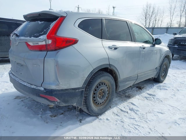 12537745 :رقم المزاد ، 2HKRW2H25JH143702 vin ، 2018 Honda Cr-v Lx مزاد بيع