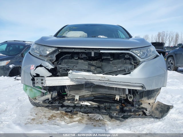 12537745 :رقم المزاد ، 2HKRW2H25JH143702 vin ، 2018 Honda Cr-v Lx مزاد بيع