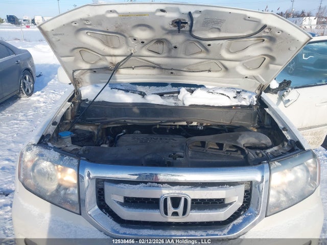 12538456 :رقم المزاد ، 5FNYF4H97BB502102 vin ، 2011 Honda Pilot Touring مزاد بيع