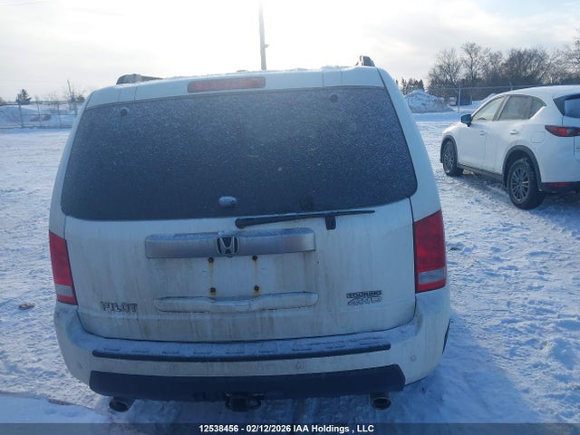 12538456 :رقم المزاد ، 5FNYF4H97BB502102 vin ، 2011 Honda Pilot Touring مزاد بيع