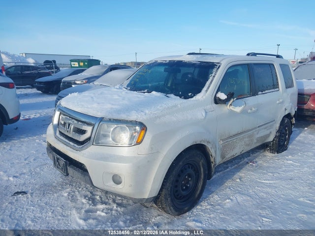 12538456 :رقم المزاد ، 5FNYF4H97BB502102 vin ، 2011 Honda Pilot Touring مزاد بيع