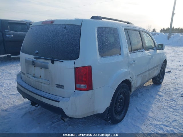12538456 :رقم المزاد ، 5FNYF4H97BB502102 vin ، 2011 Honda Pilot Touring مزاد بيع