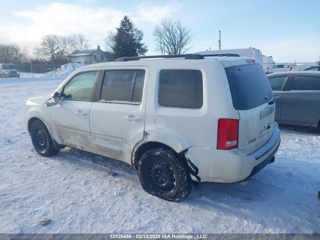 12538456 :رقم المزاد ، 5FNYF4H97BB502102 vin ، 2011 Honda Pilot Touring مزاد بيع