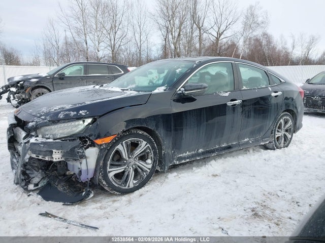 2HGFC1F95JH100459 Honda Civic Touring