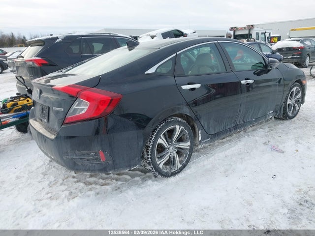 2HGFC1F95JH100459 Honda Civic Touring