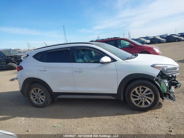 KM8J3CA40HU551589 Hyundai TUCSON SE