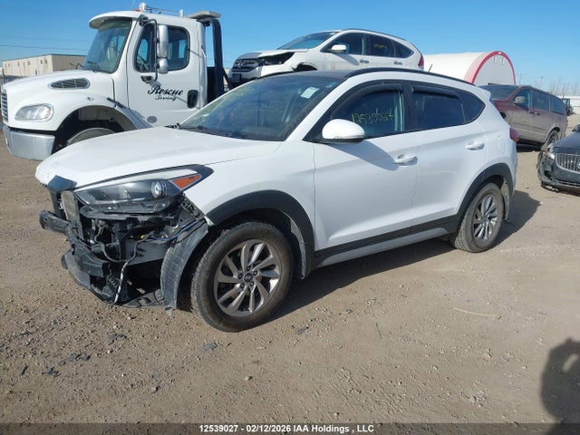 KM8J3CA40HU551589 Hyundai TUCSON SE