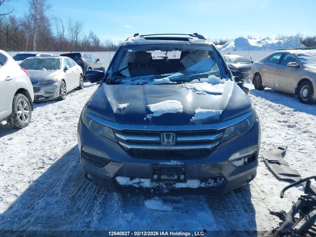 5FNYF6H57GB510698 Honda PILOT EXL