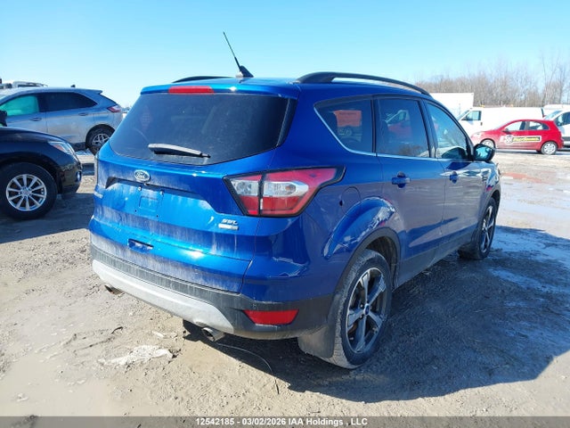 1FMCU9H95JUD39545 Ford ESCAPE SEL