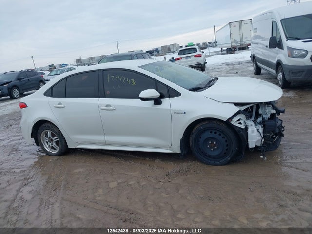 12542438 :رقم المزاد ، JTDBAMDE5MJ010803 vin ، 2021 Toyota Corolla Hybrid Base W/li Battery مزاد بيع