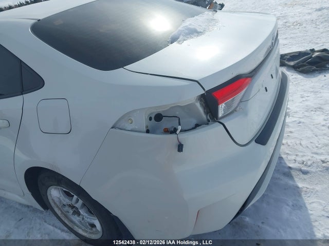 12542438 :رقم المزاد ، JTDBAMDE5MJ010803 vin ، 2021 Toyota Corolla Hybrid Base W/li Battery مزاد بيع