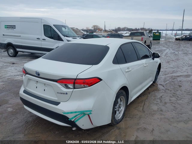 12542438 :رقم المزاد ، JTDBAMDE5MJ010803 vin ، 2021 Toyota Corolla Hybrid Base W/li Battery مزاد بيع