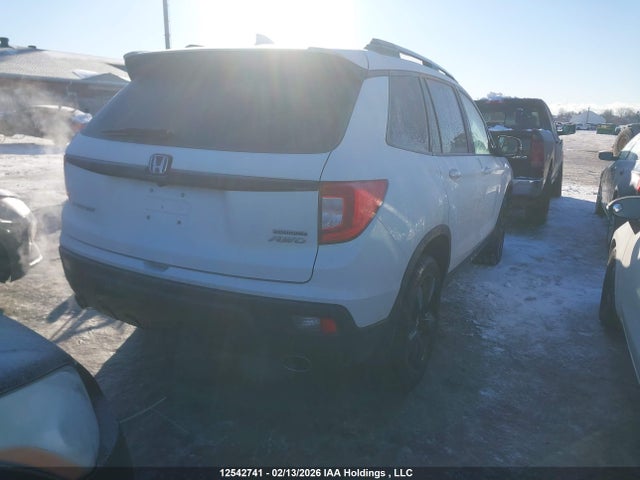 5FNYF8H94MB500530 Honda Passport Touring