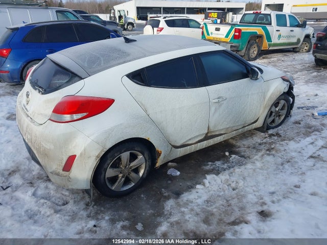 12542994 :رقم المزاد ، KMHTC6AD1DU142201 vin ، 2013 Hyundai Veloster Tech مزاد بيع