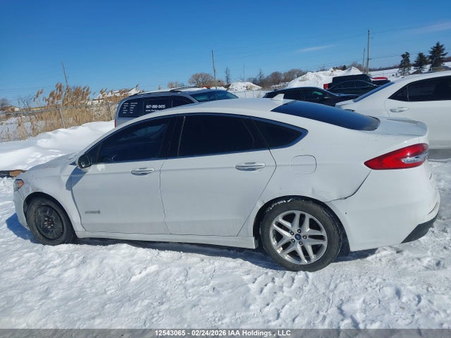3FA6P0MU7KR155303 Ford Fusion Hybrid Sel