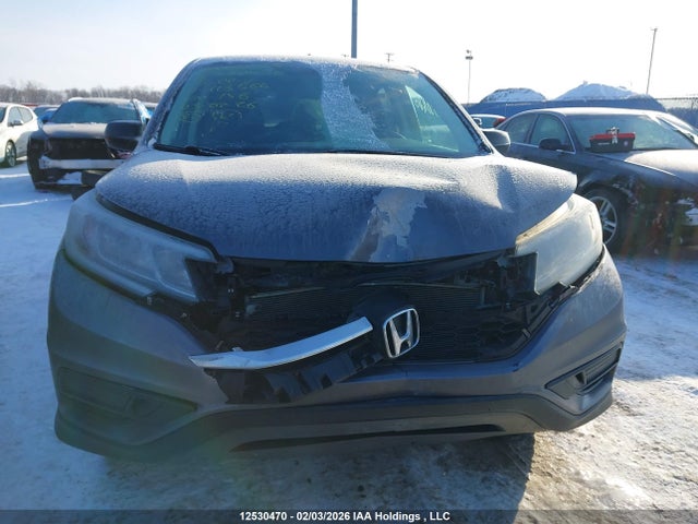 2HKRM4H36FH118566 Honda CR-V LX