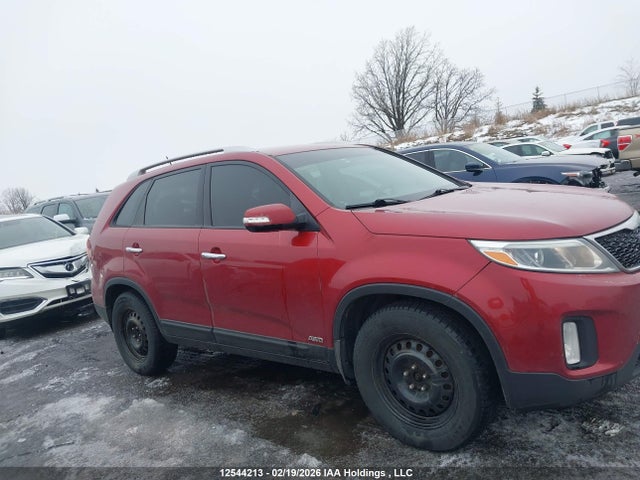 5XYKTCA63EG431549 KIA SORENTO LX