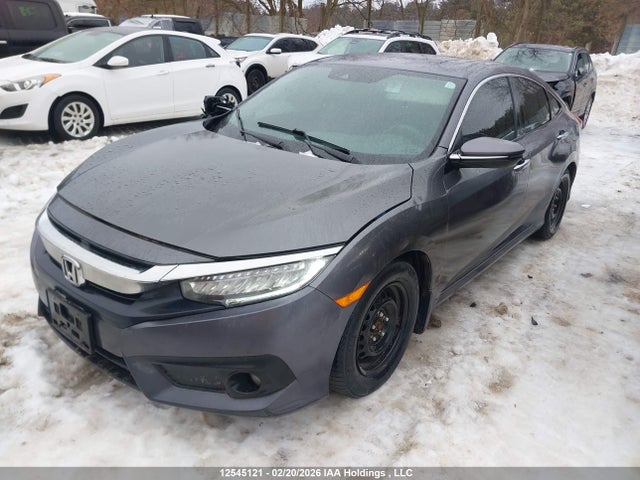 Honda Civic Touring 2017 2HGFC1F9XHH102704 Image 2