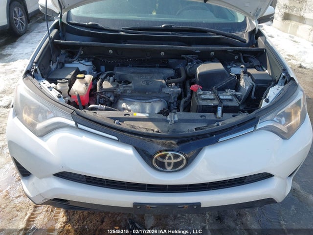 2T3ZFREV9JW429231 Toyota RAV4 LE