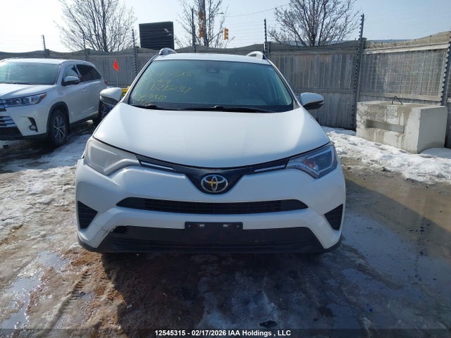 2T3ZFREV9JW429231 Toyota RAV4 LE