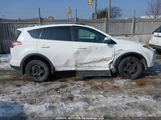 2T3ZFREV9JW429231 Toyota RAV4 LE