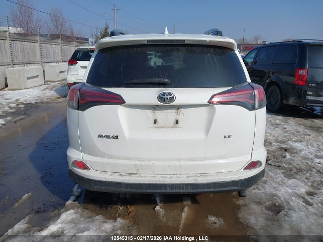 2T3ZFREV9JW429231 Toyota RAV4 LE