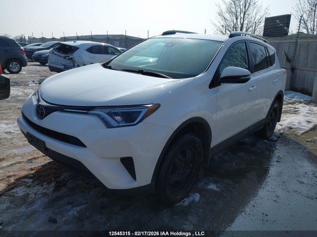 2T3ZFREV9JW429231 Toyota RAV4 LE