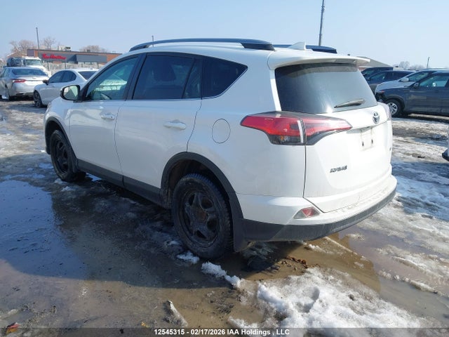 2T3ZFREV9JW429231 Toyota RAV4 LE