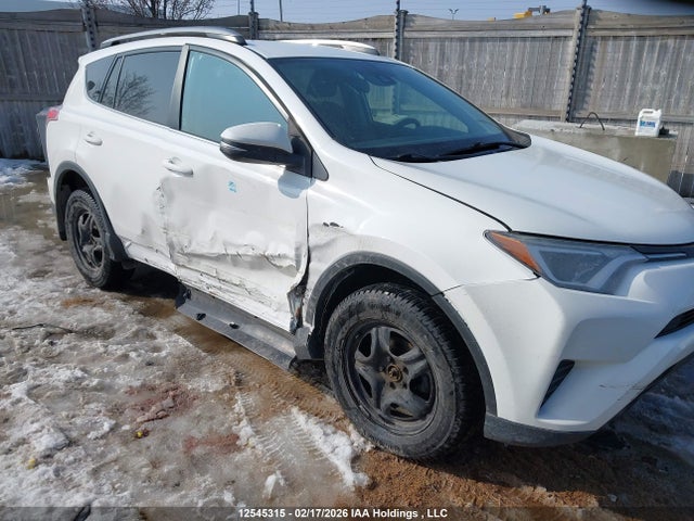 2T3ZFREV9JW429231 Toyota RAV4 LE