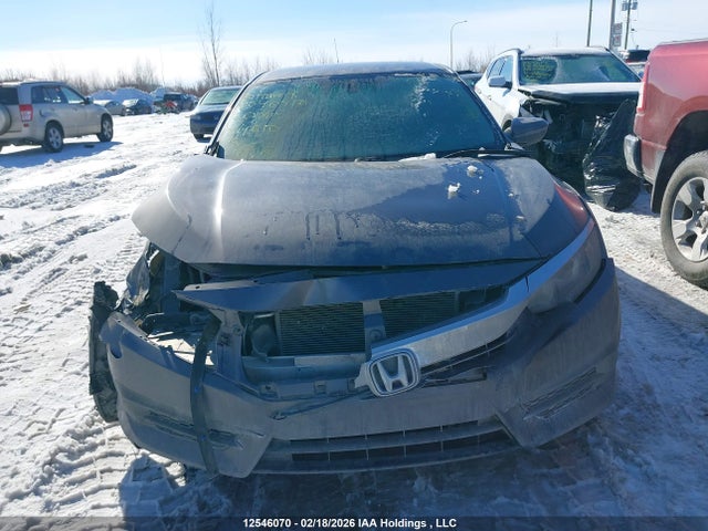 2HGFC2E5XGH011810 Honda Civic Lx