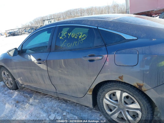 2HGFC2E5XGH011810 Honda Civic Lx