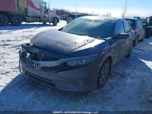 2HGFC2E5XGH011810 Honda Civic Lx