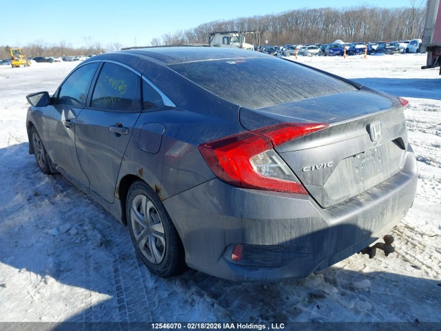 2HGFC2E5XGH011810 Honda Civic Lx